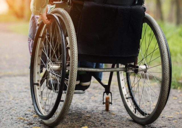 Deficiente físico na cadeira de rodas em Natal